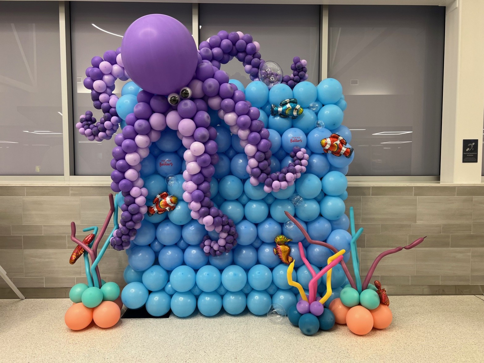 A purple octopus balloon sculpture